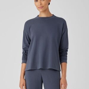 15. Eileen Fisher Women's Classic “Hug” Blue Top